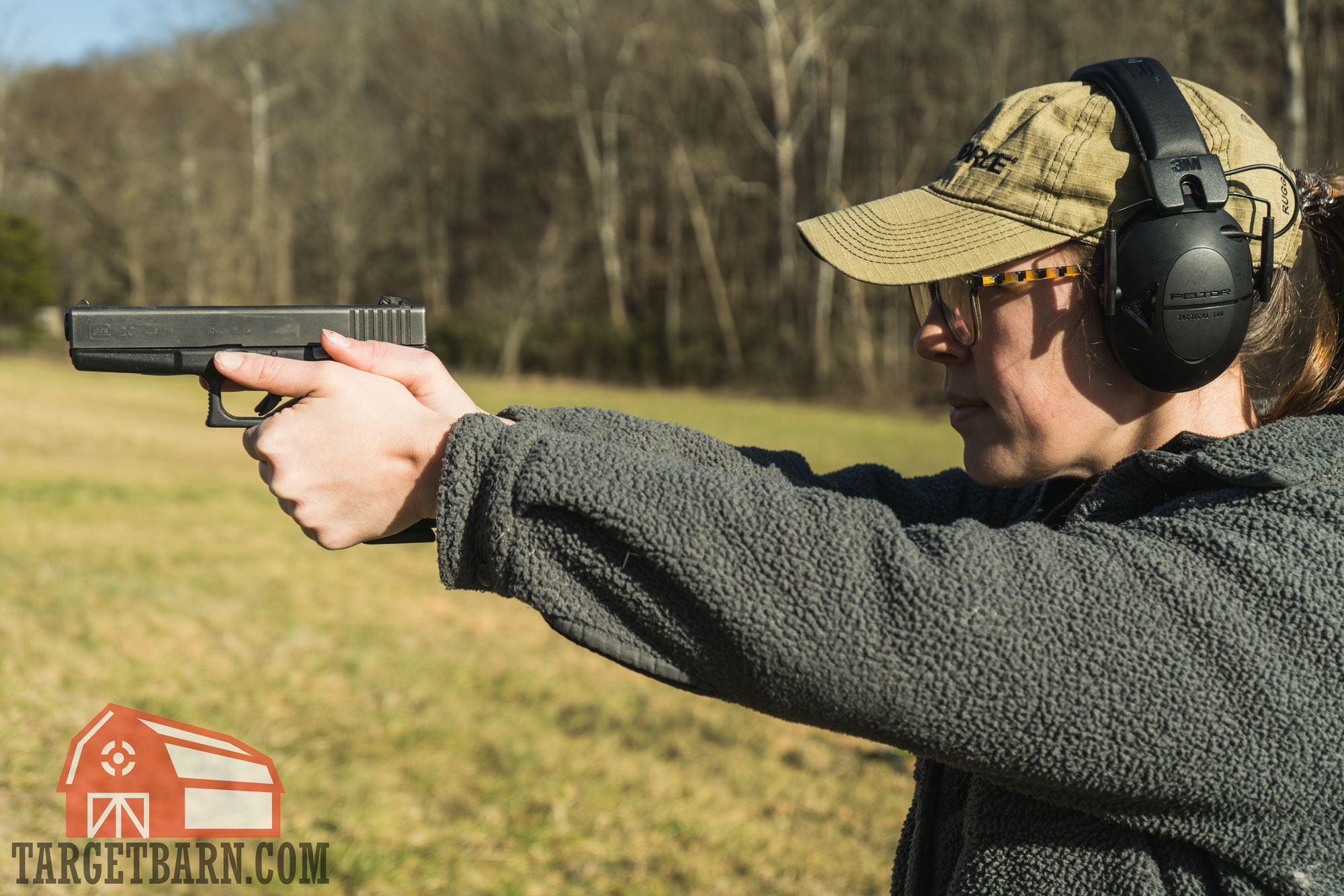 the author shooting a glock 20 10mm at the range