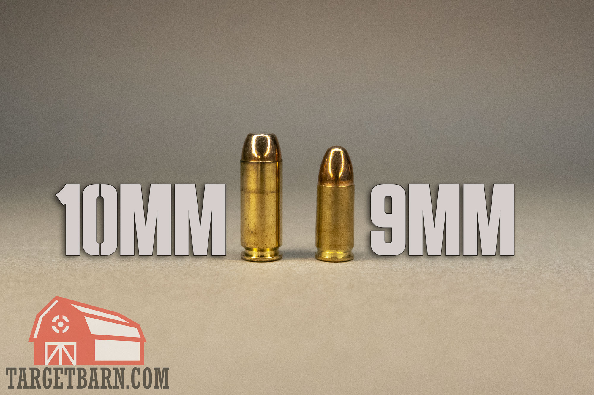 showing a 10mm bullet next to a 9mm bullet