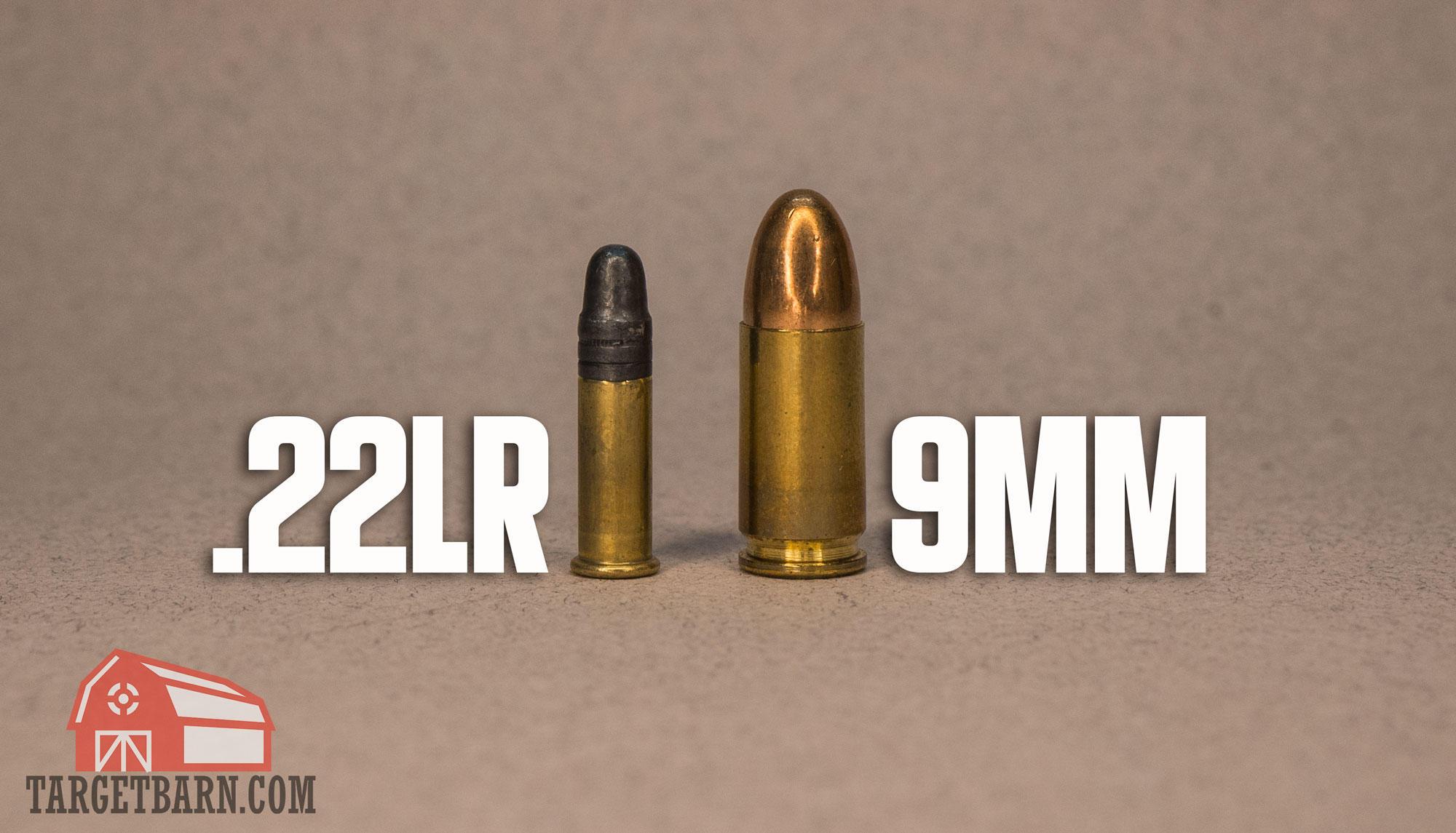 a .22lr round next to a 9mm round