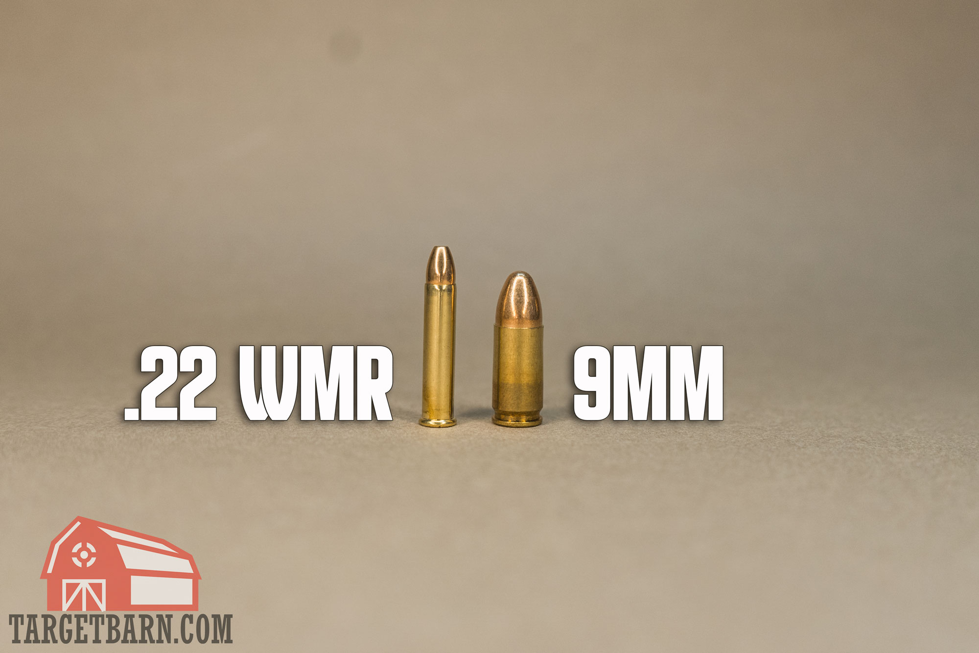 a .22 wmr round next to a 9mm round labeled with each caliber