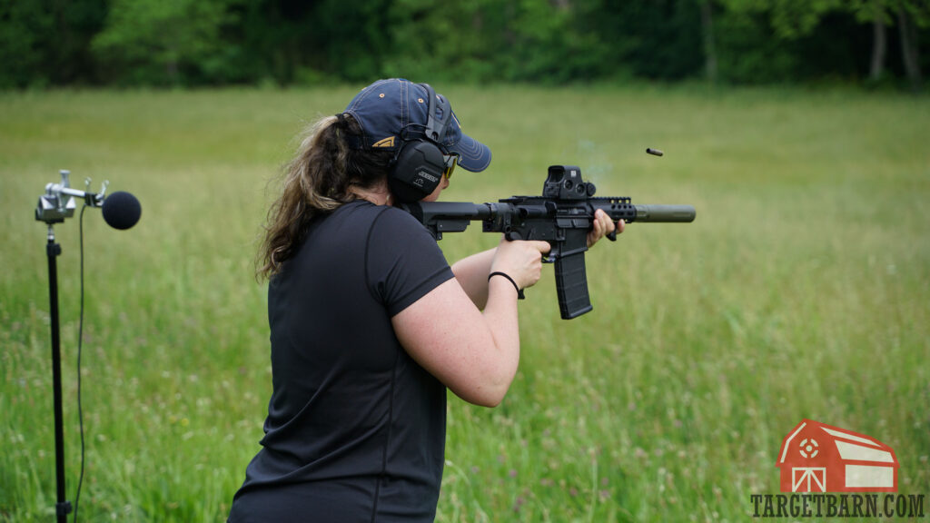 a woman shooting a 300 blackout suppressed for the decibel test to find the quietest .300 blackout ammo