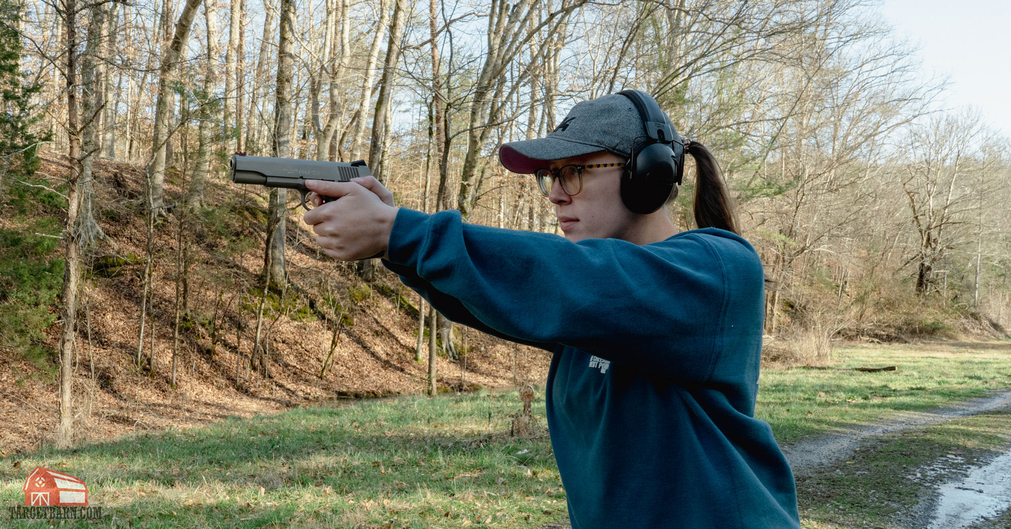 mckenzie shooting a a colt 1911 chambered in .38 super 