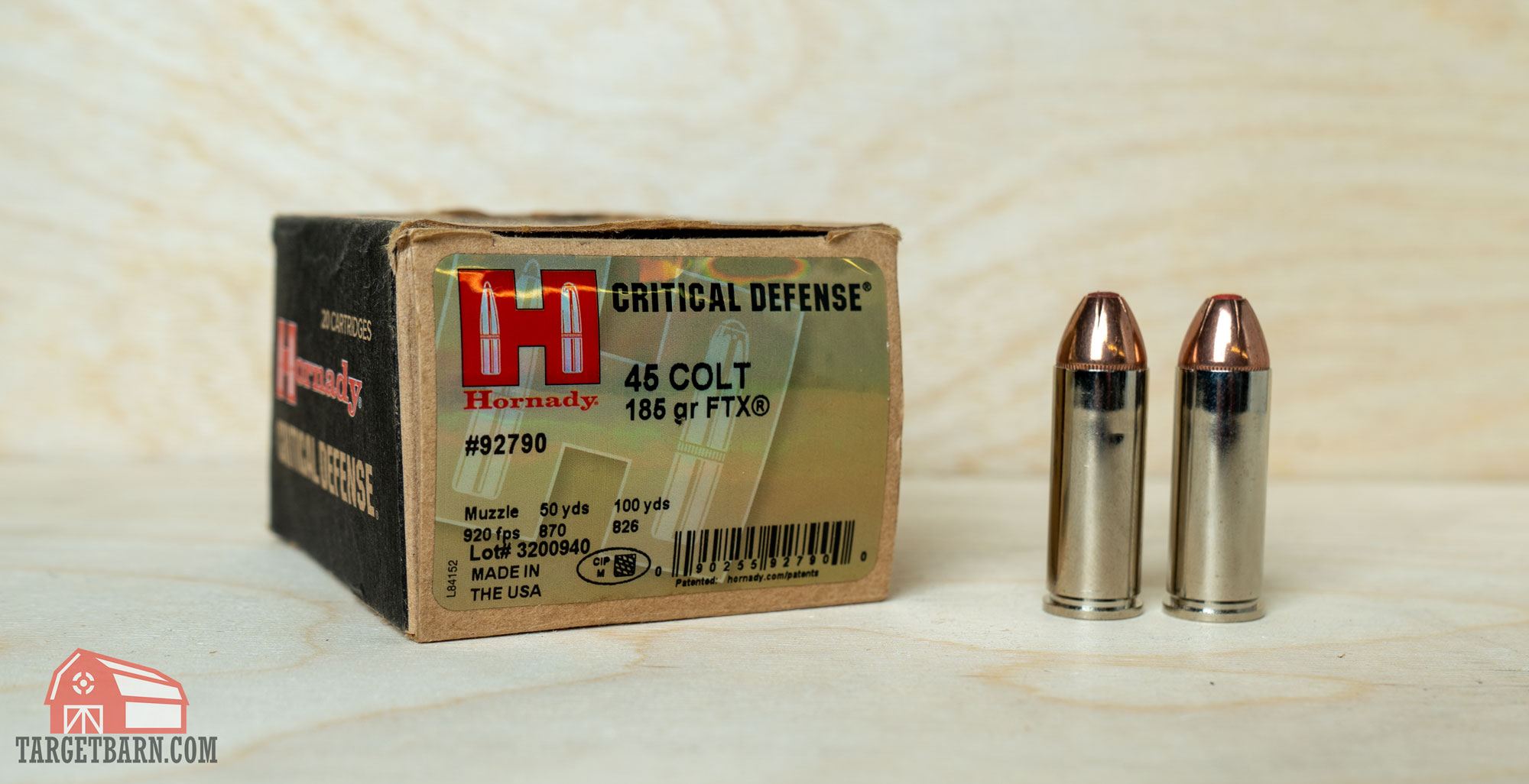 a box of hornady critical defense .45 colt and two rounds