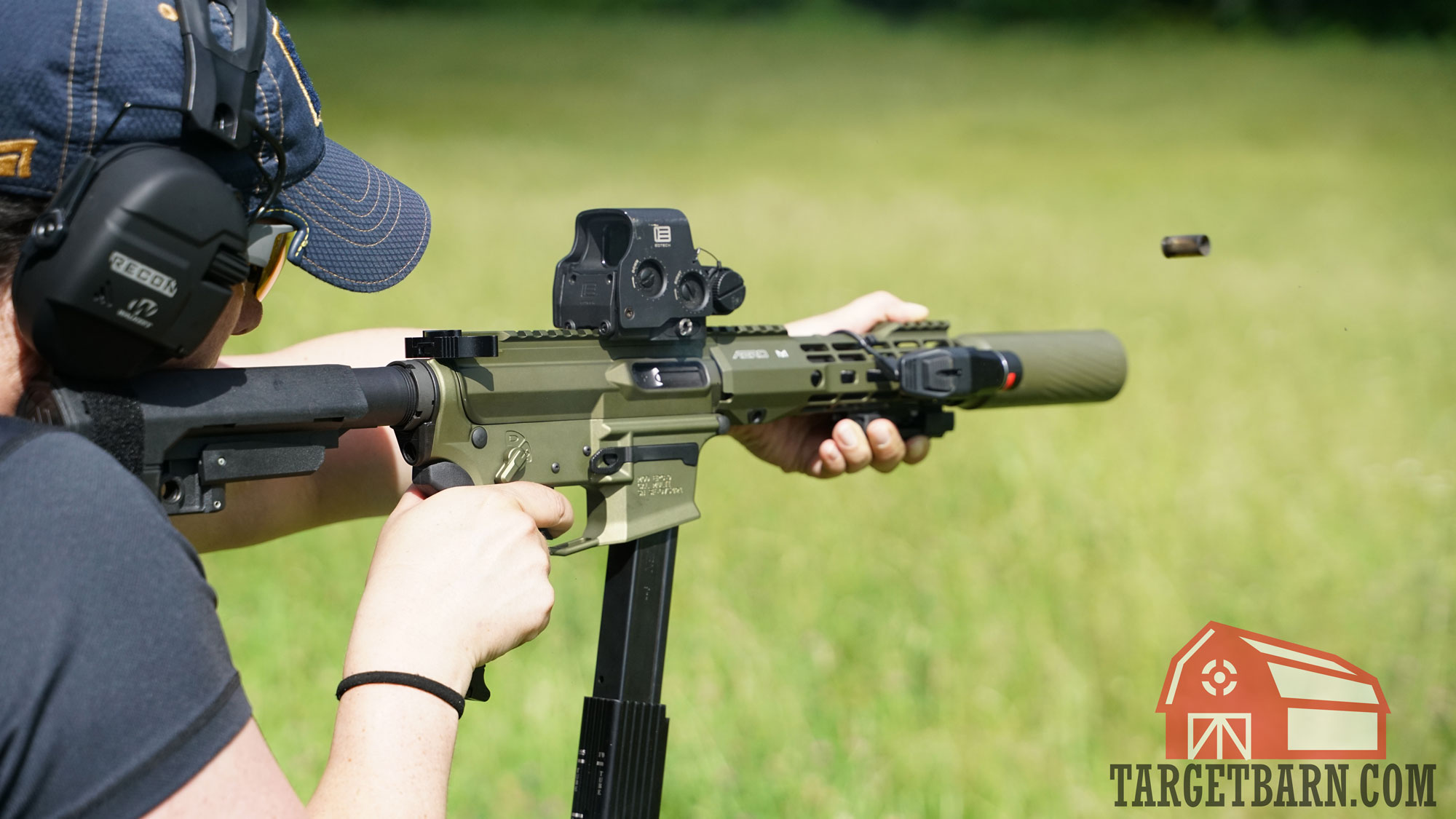 a woman shooting a 9mm pdw to test for the quietest 9mm ammo