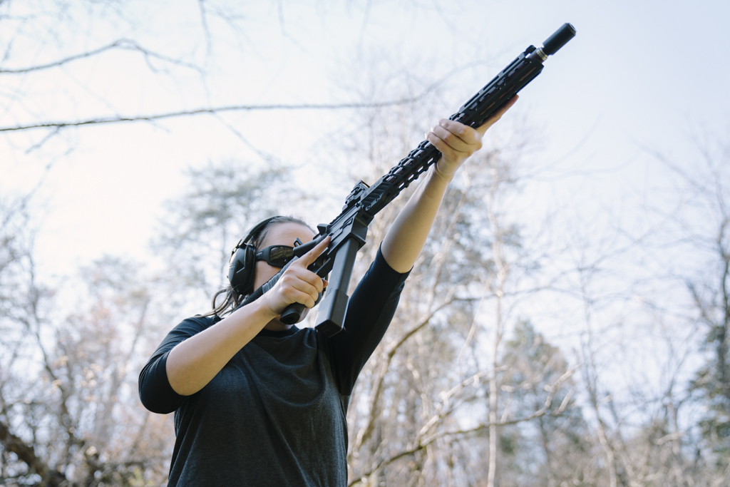 the author shooting a pistol caliber carbine