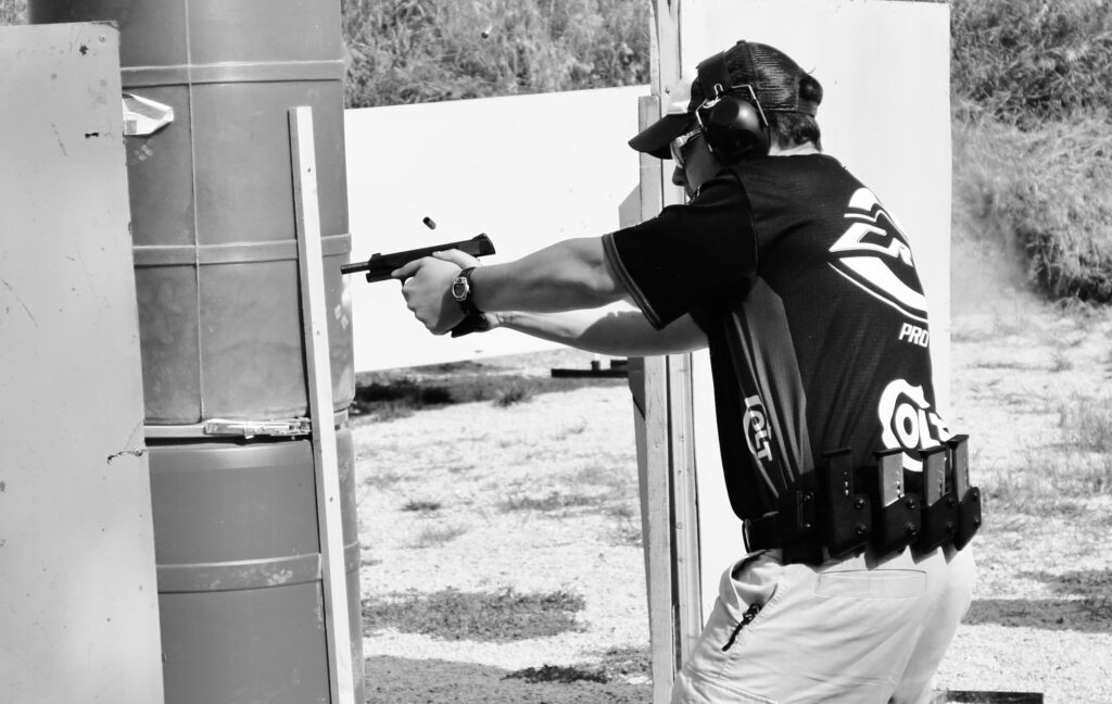 The author using a USPSA scoring strategy during a match