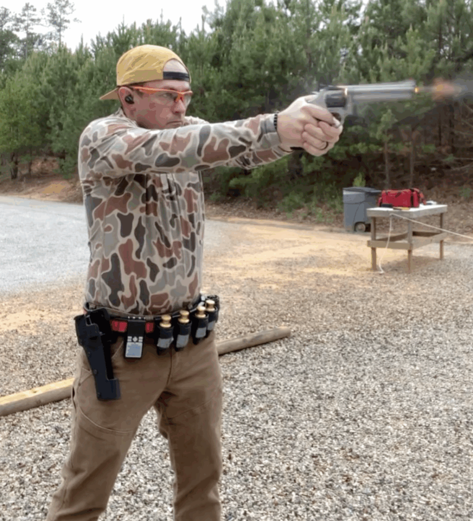 The author shooting Bill Drill Caleb, the author, shooting the Bill Drill at a gun range.