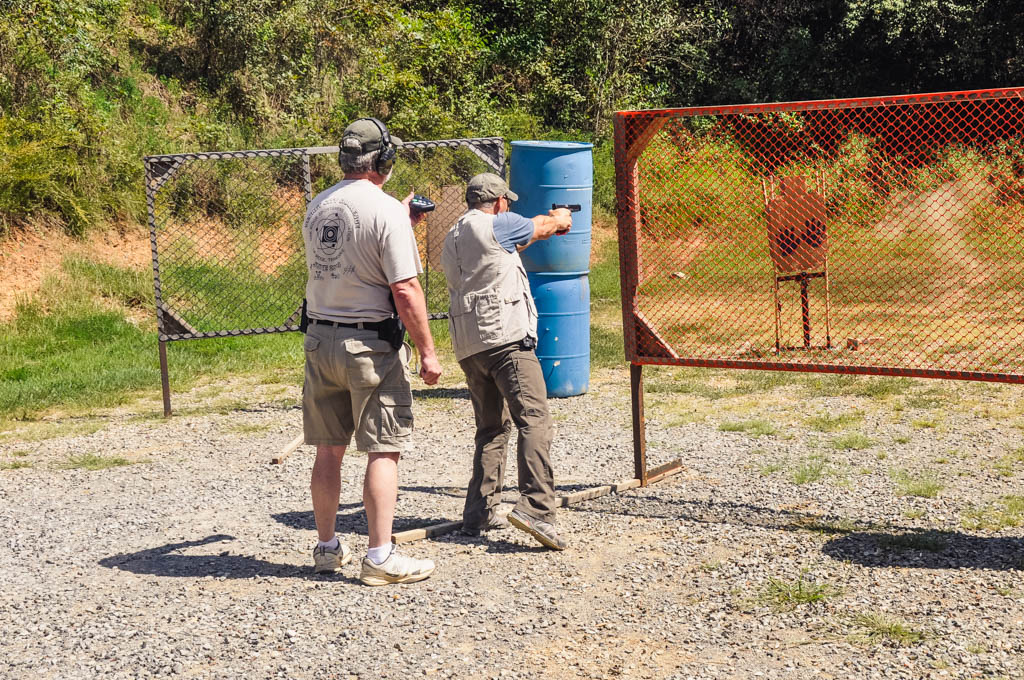 idpa shooter shooting a course of fire