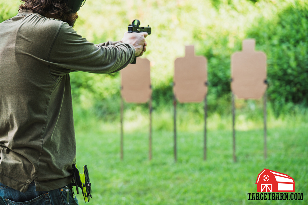 Shooting El Presidente Drill The author shooting the El Presidente drill at the range