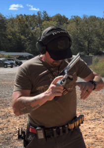 Reloading a revolver as part of the FAST drill Caleb reloading as part of the FAST Drill training