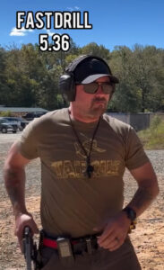 Caleb, the author preparing to shoot the F.A.S.T. drill at the range