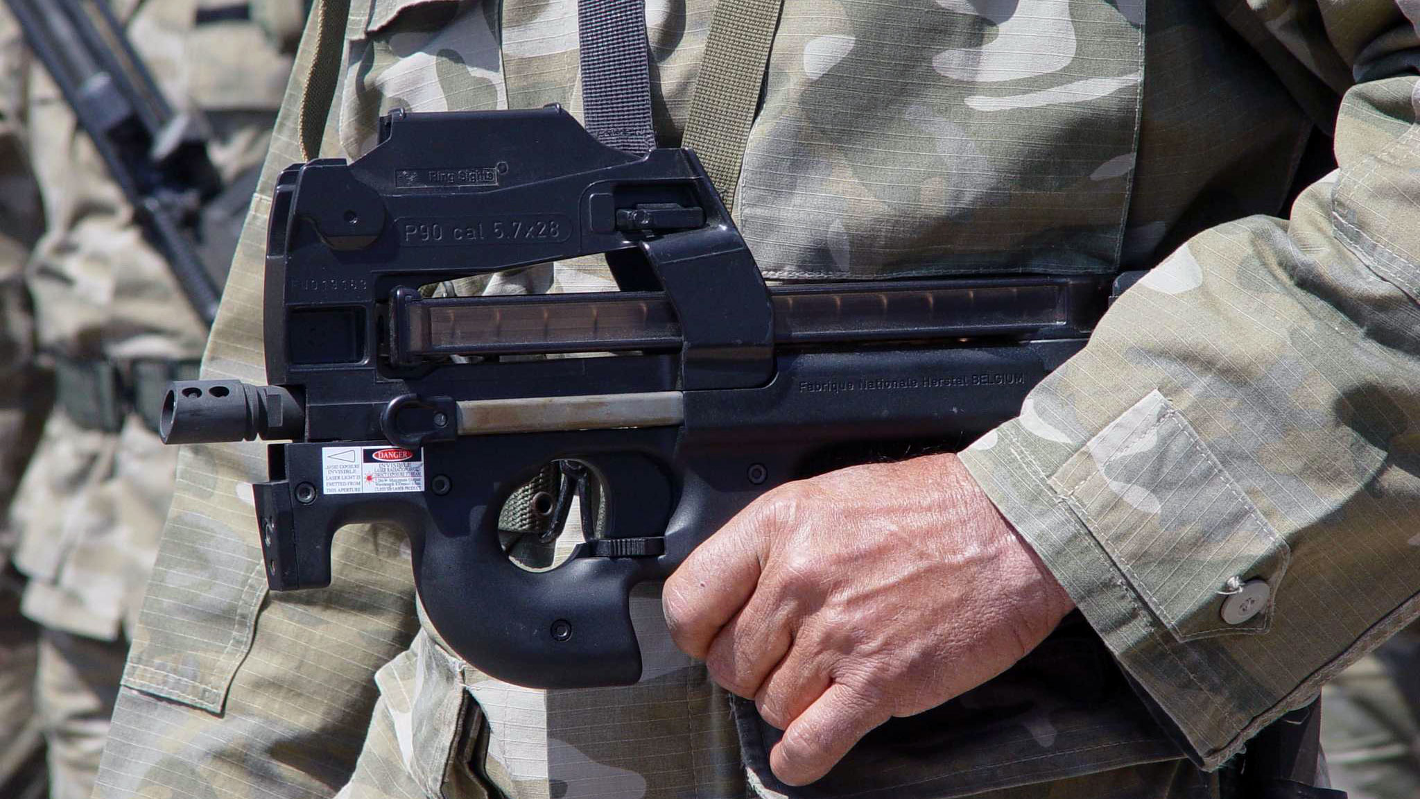 the fn p90 being carried by a member of the cypriot national guard