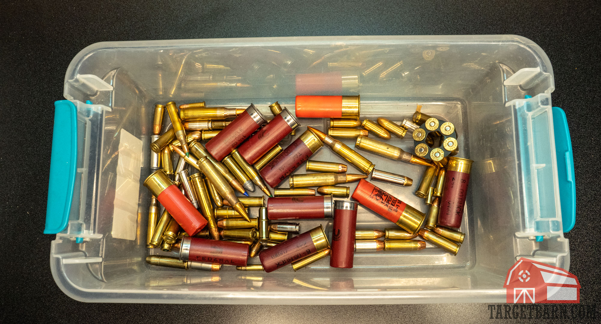 a bin full of loose rounds of different calibers
