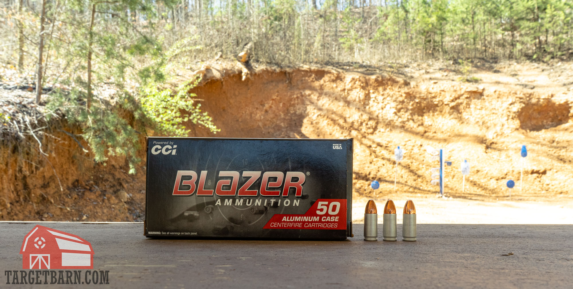a box and three rounds of blazer 9mm ammo at the range