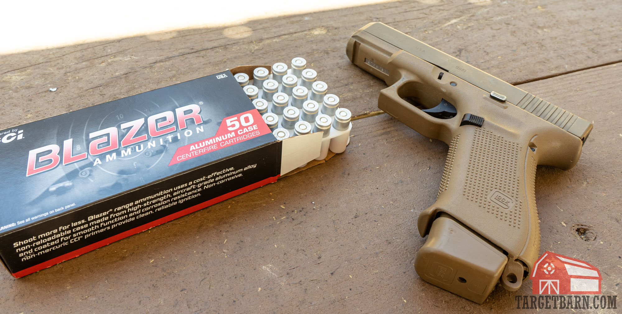 an open box of blazer 9mm and a glock 19x
