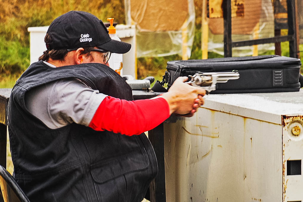 the author shooting a revolver from concealment at an idpa match