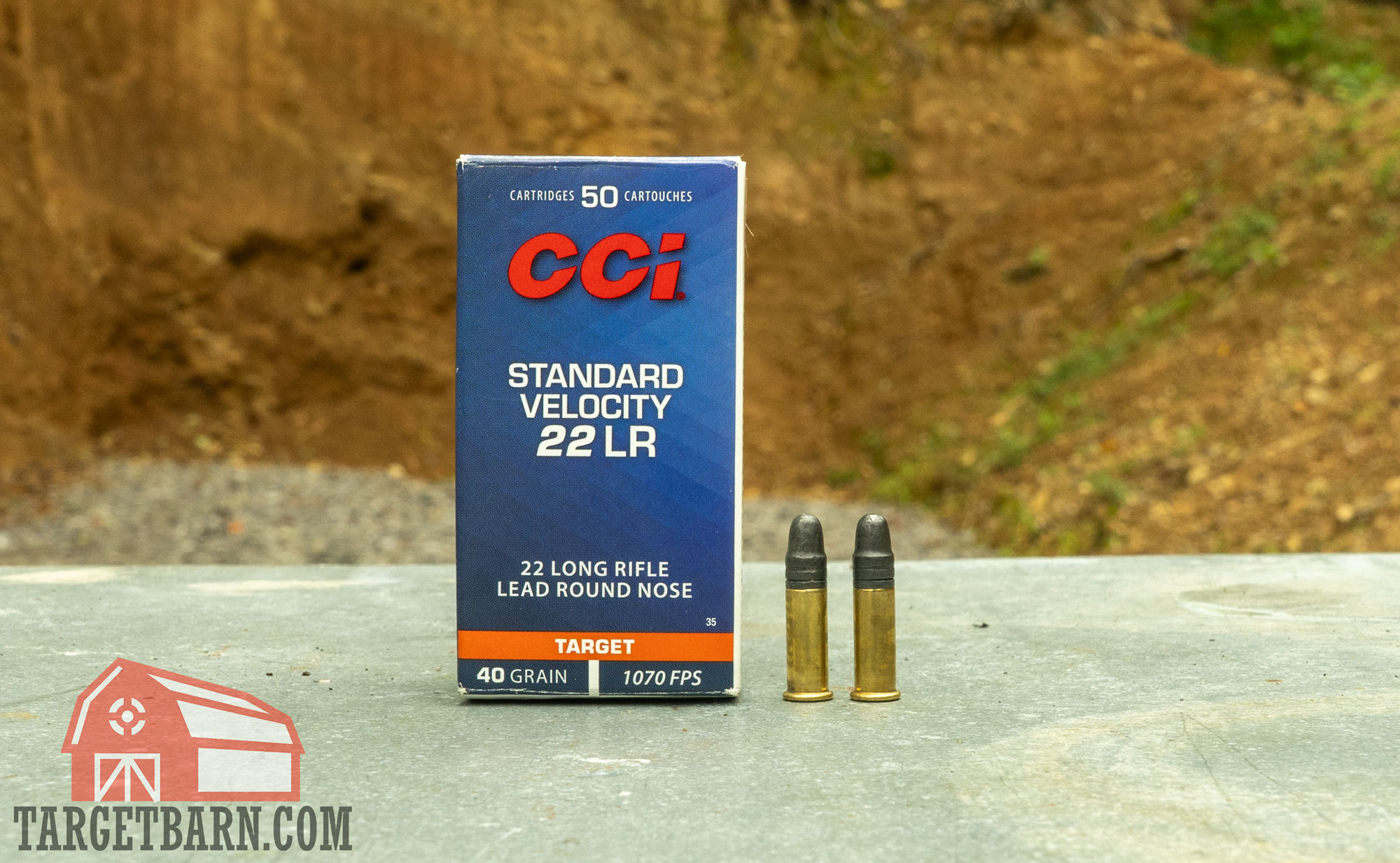 a box and two rounds of cci standard velocity .22lr at the range