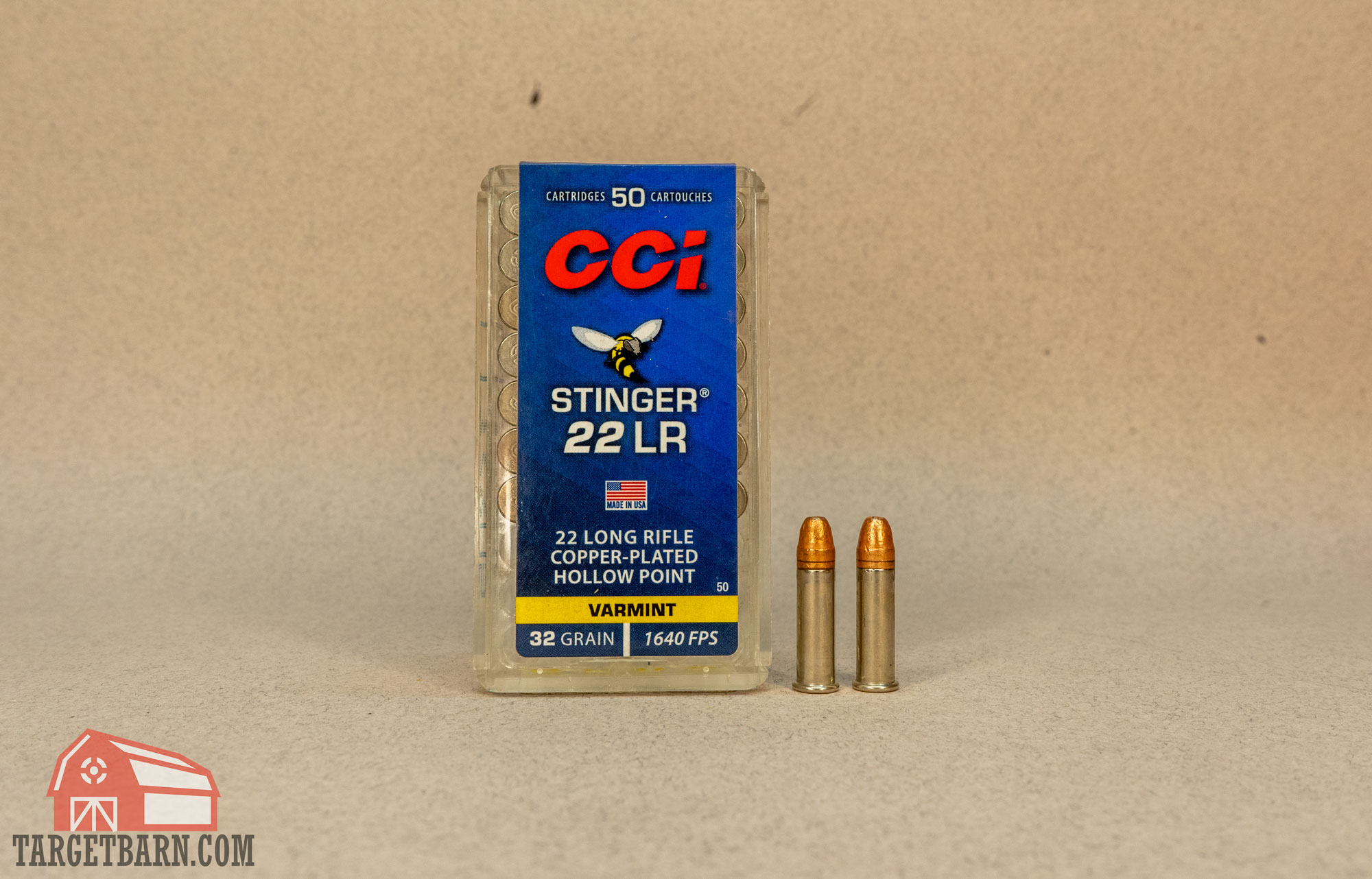 a box and two rounds of cci stinger 22lr ammo