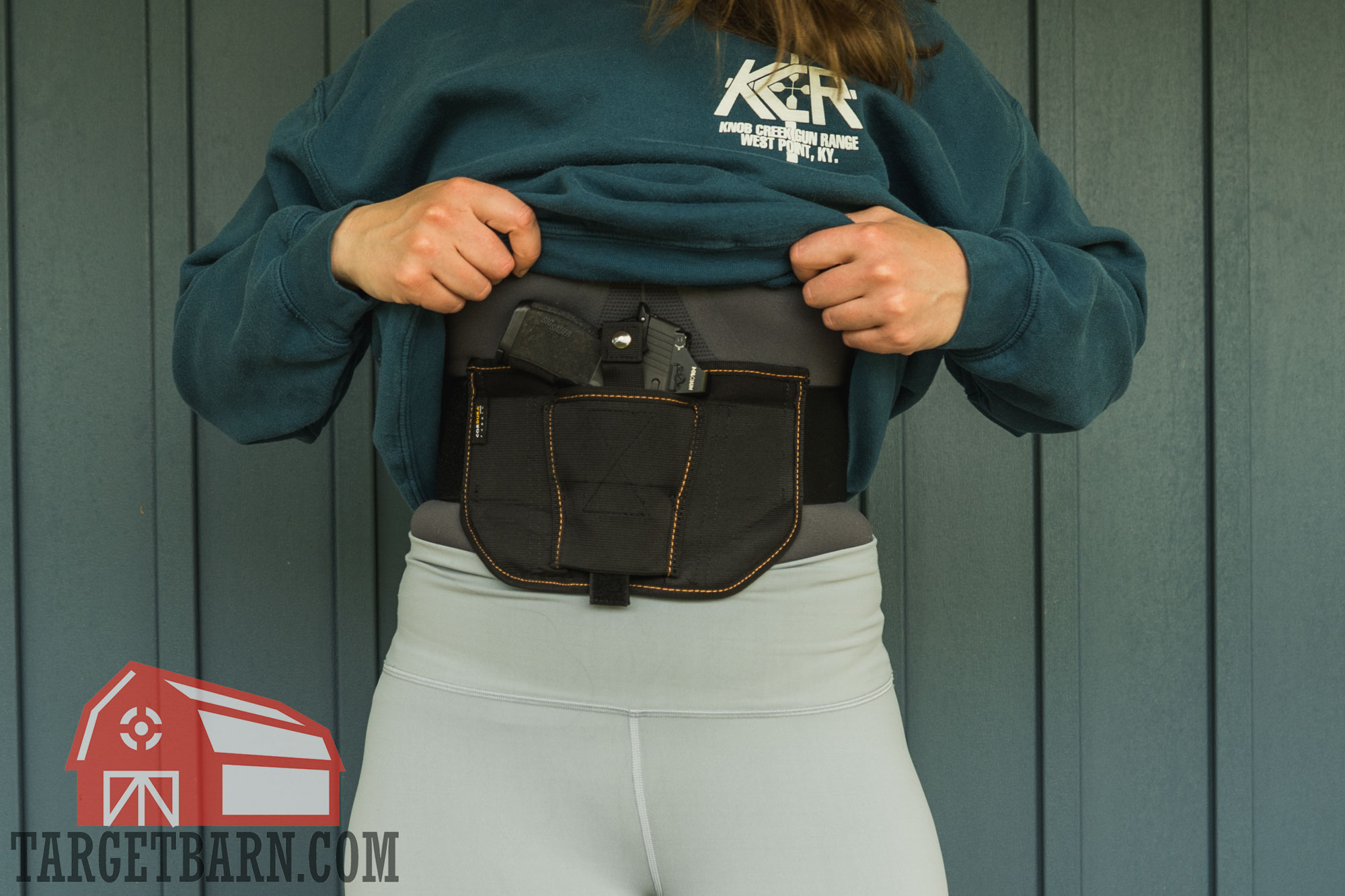 wearing the vnsh under a sweatshirt