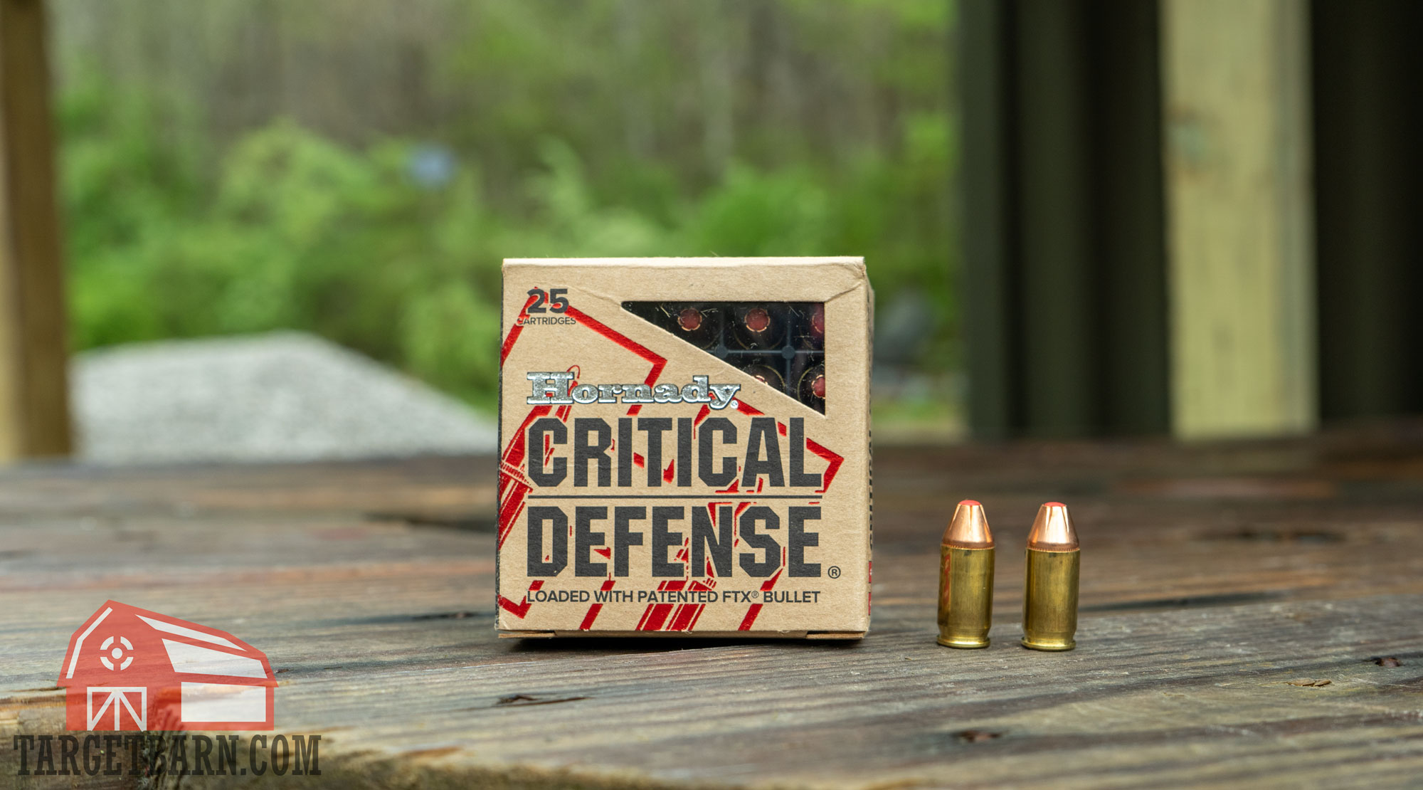 a box and two rounds of hornady critical defense 380 at the range