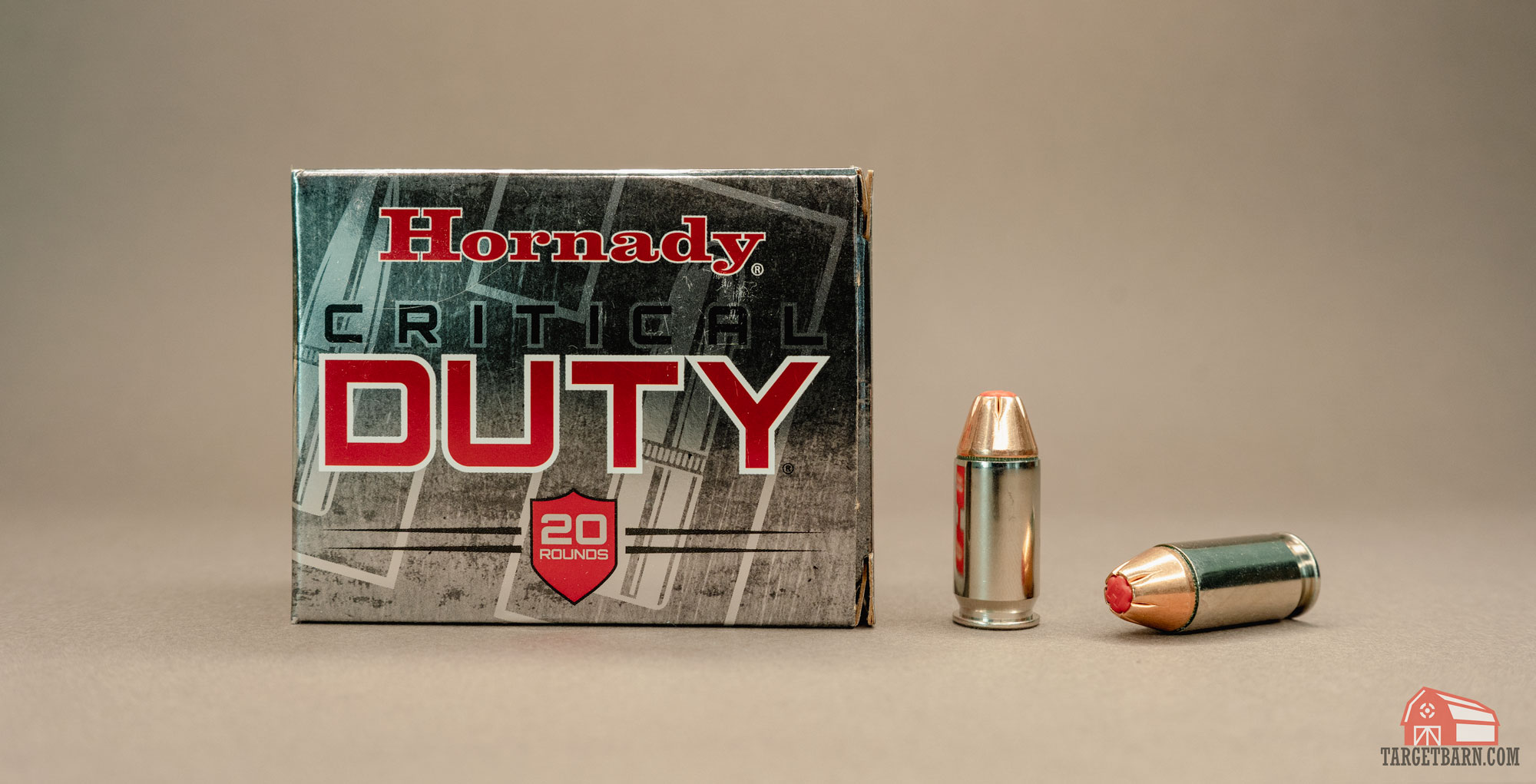 a box and two rounds of .45acp hornady critical duty showing the flexlock bullet