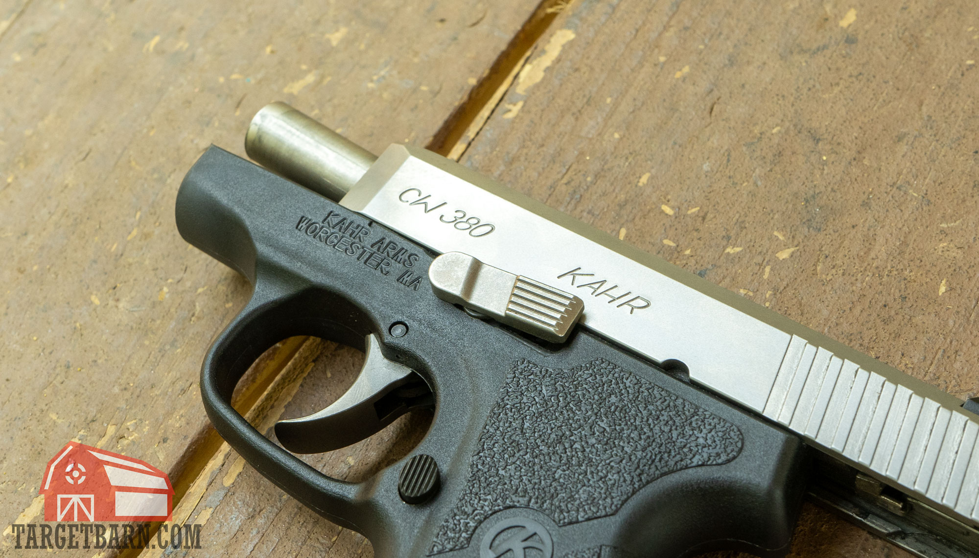 showing the kahr cw380's slide release