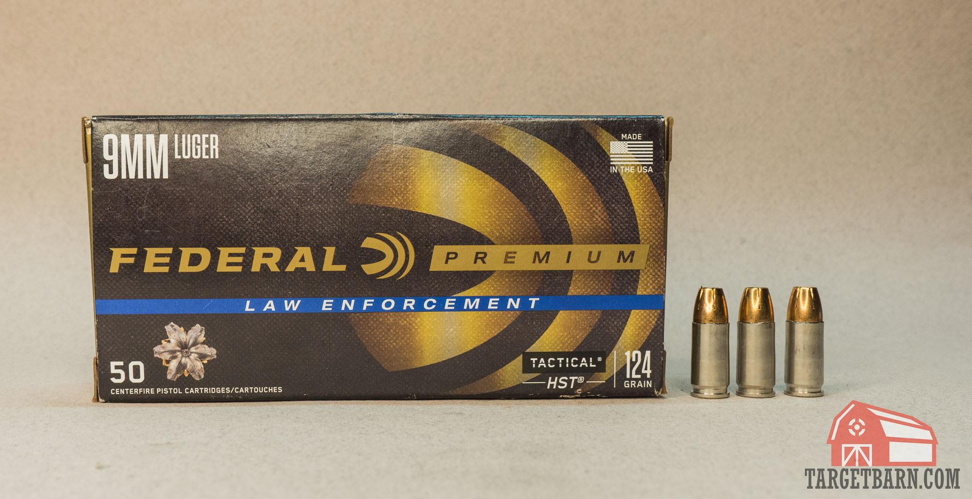 a box and three rounds of federal premium le 124gr. hst jhp