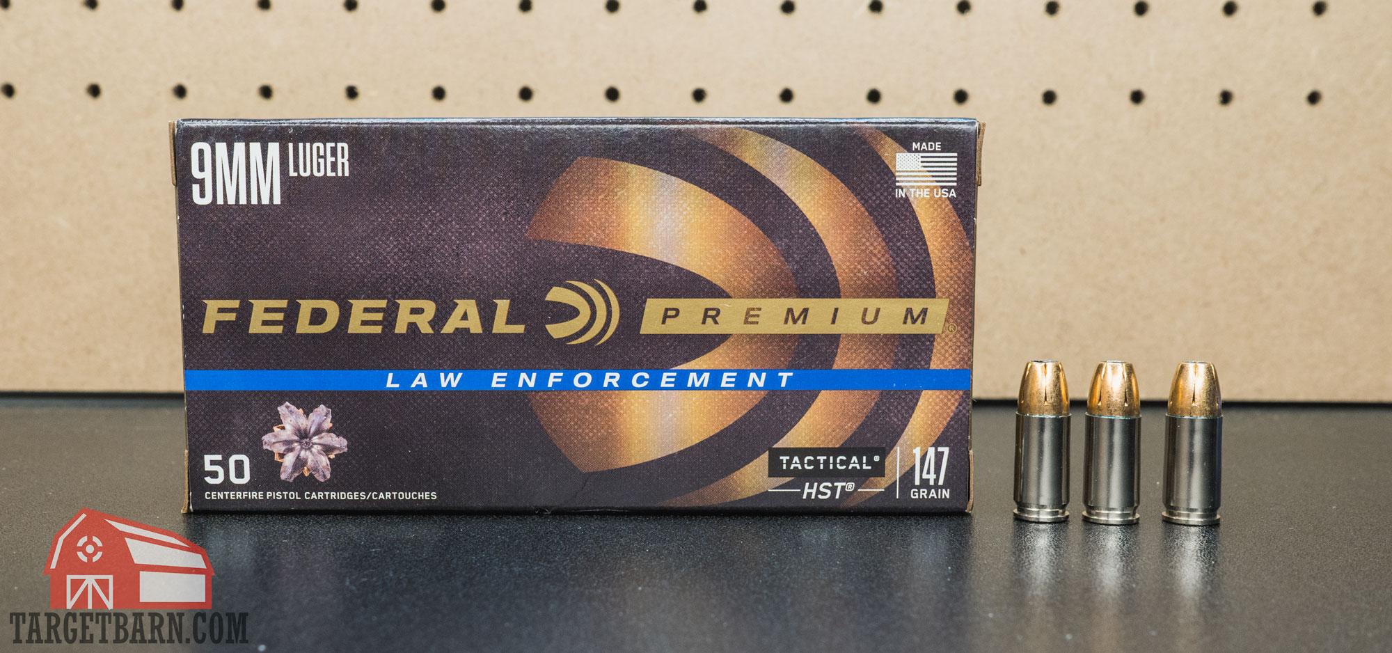 a box and three rounds of federal le 147gr. hst jhp ammo