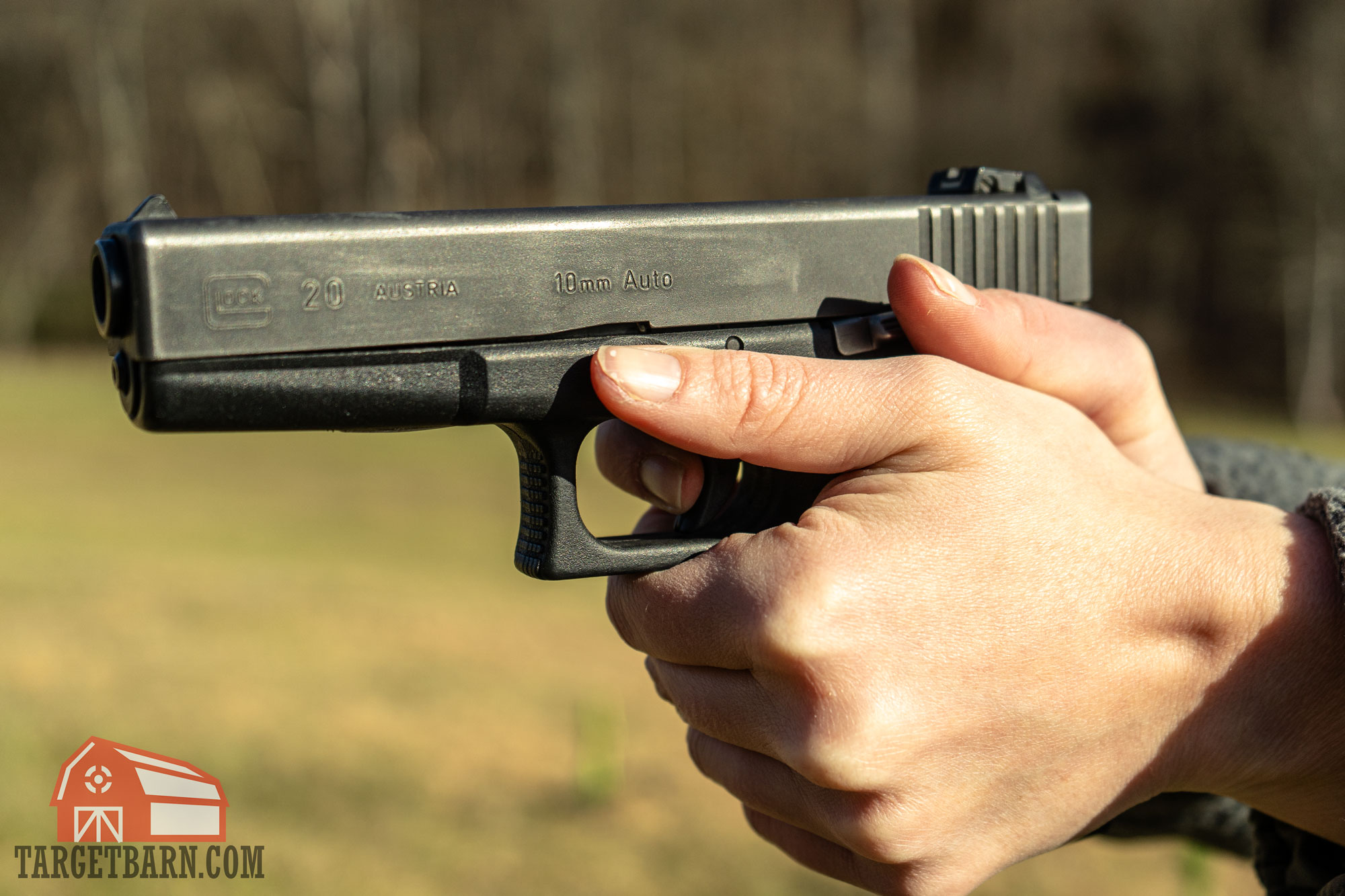 a glock 29 10mm pistol being shot at the range