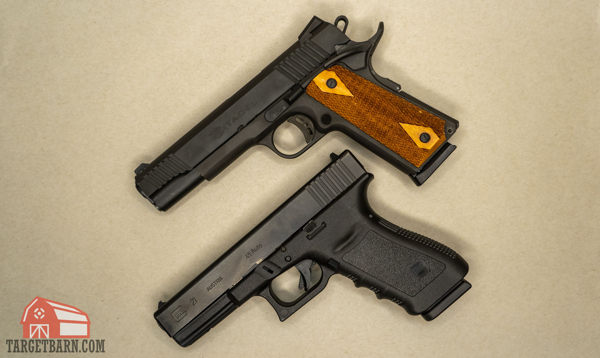 a glock vs. 1911 next to each other