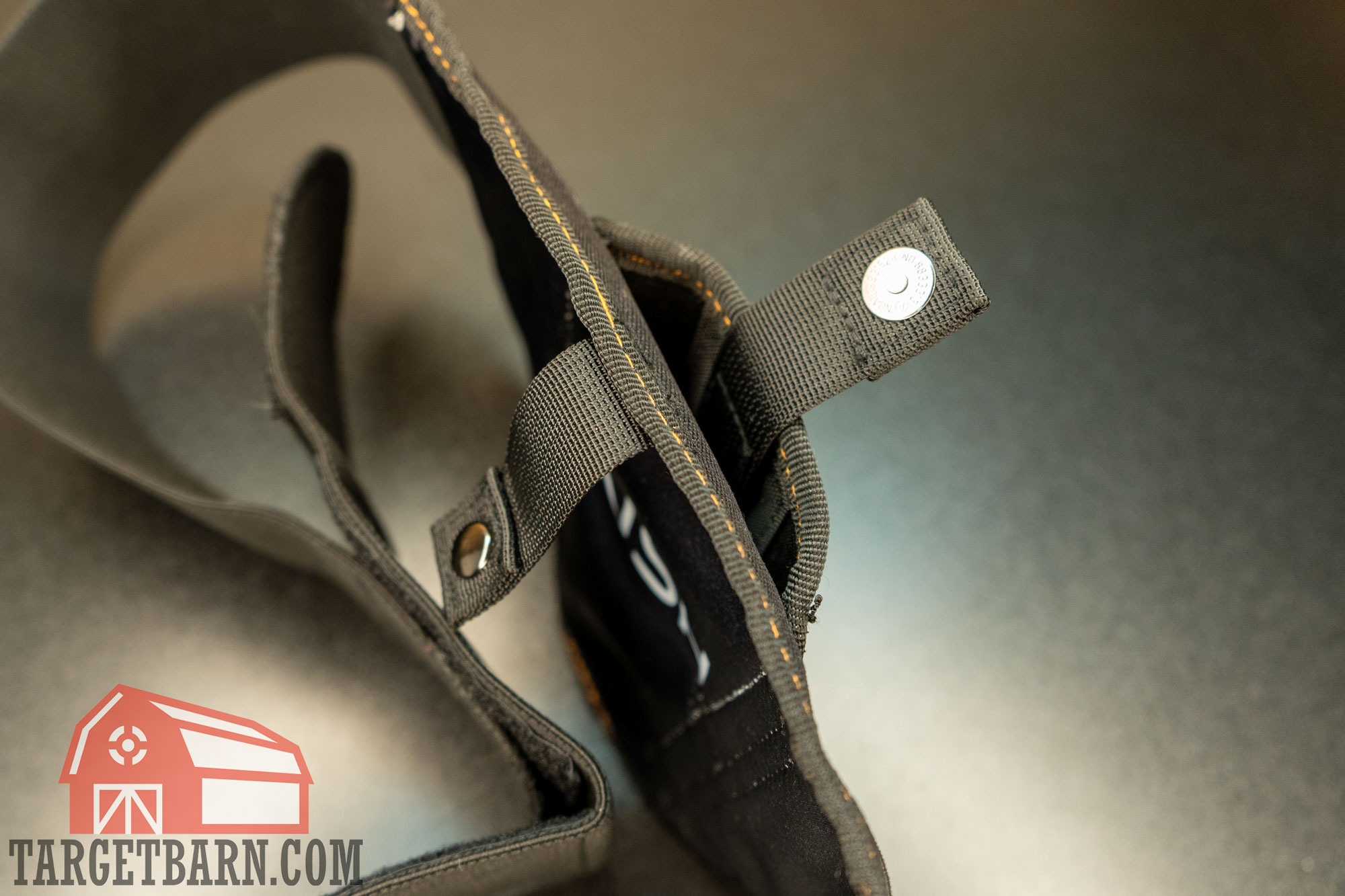 showing the mouth of the holster pocket