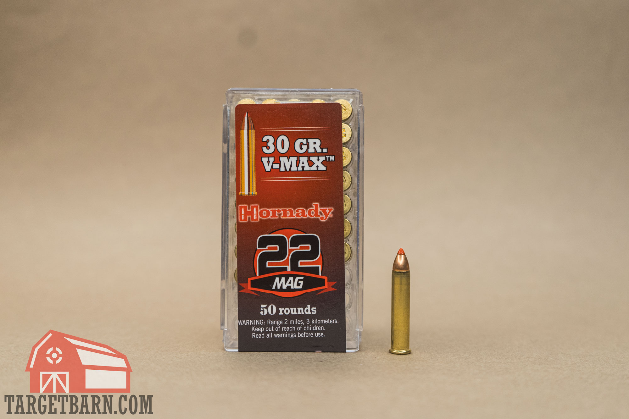 a box and one round of Hornady 22 mag vmax ammo