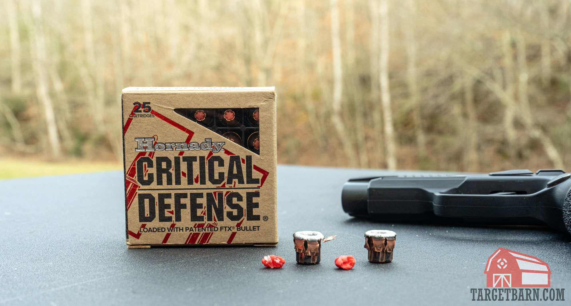 a box and two expanded rounds of hornady critical defense 9mm