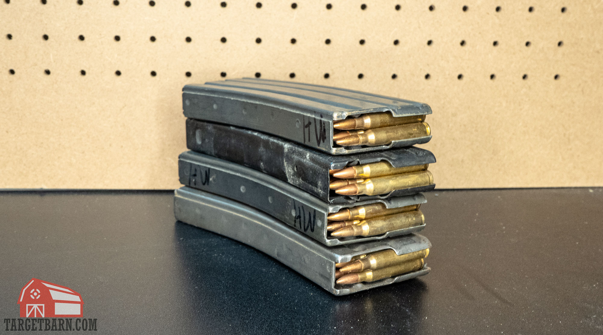 four ar-15 magazines loaded with rounds for storage
