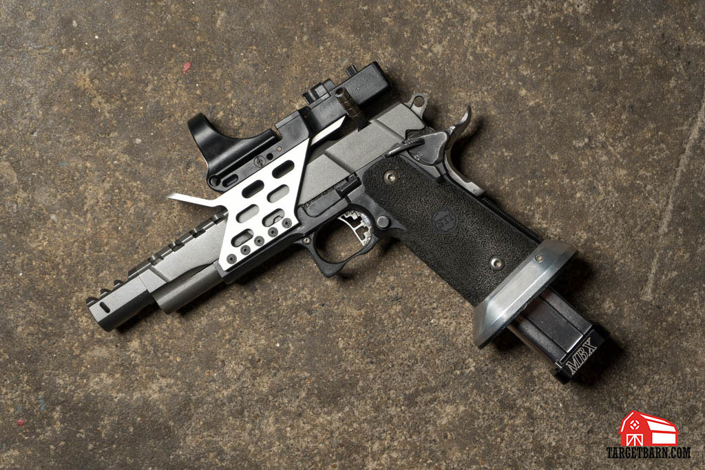a USPSA Open gun is made to go fast and is highly customized