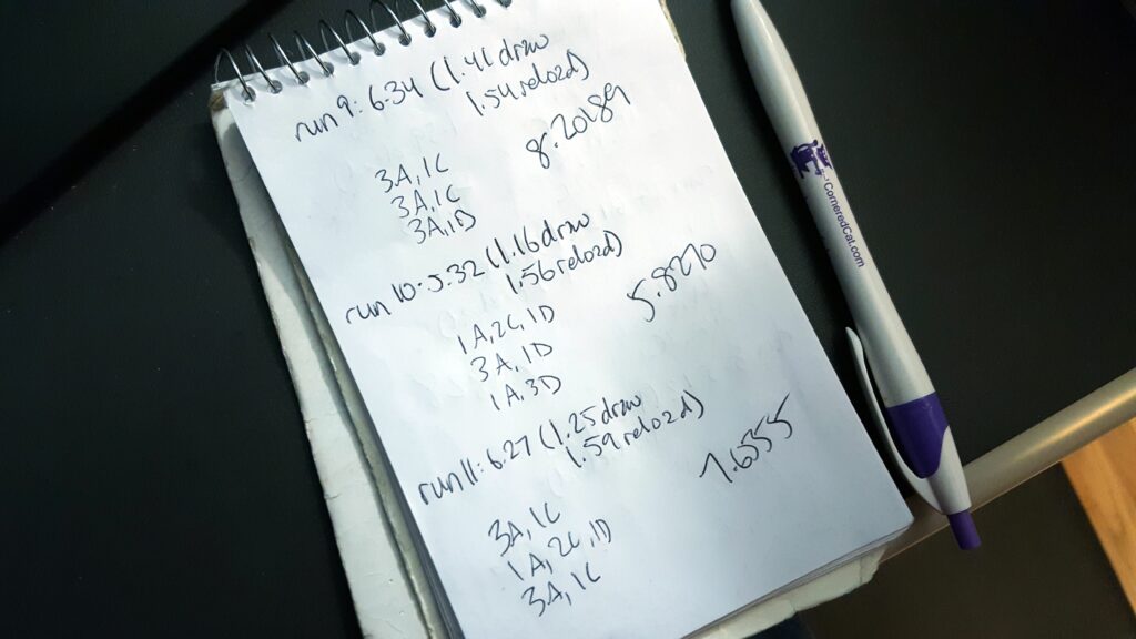 range journal with scores and hits recorded