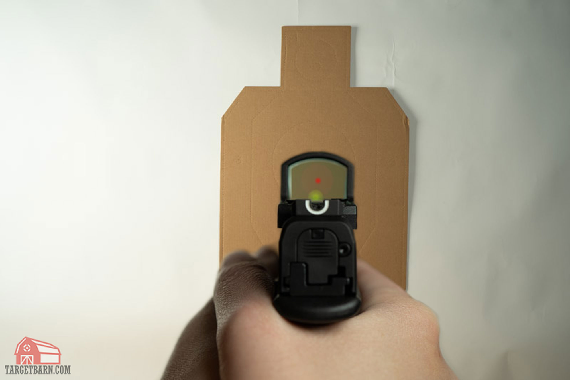 with red dot sights, put the dot on the target with a focus on the target