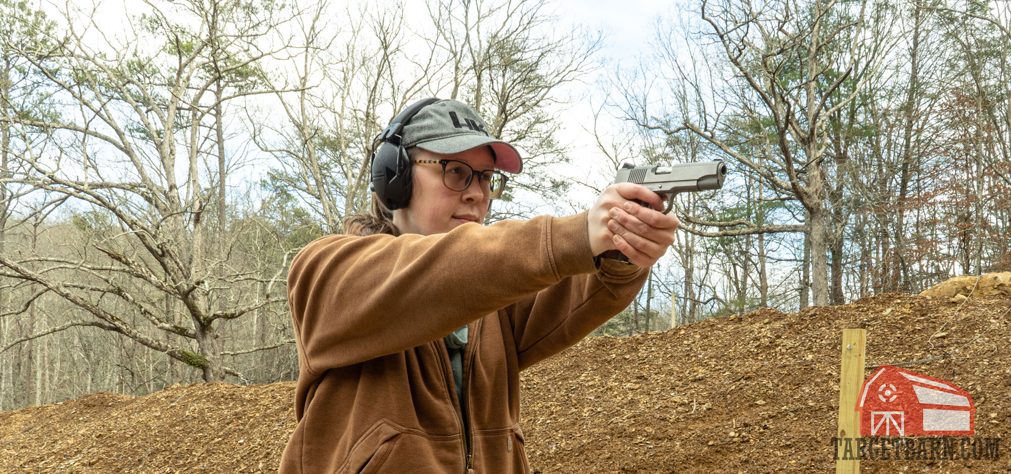 the author shooting a 1911 pistol