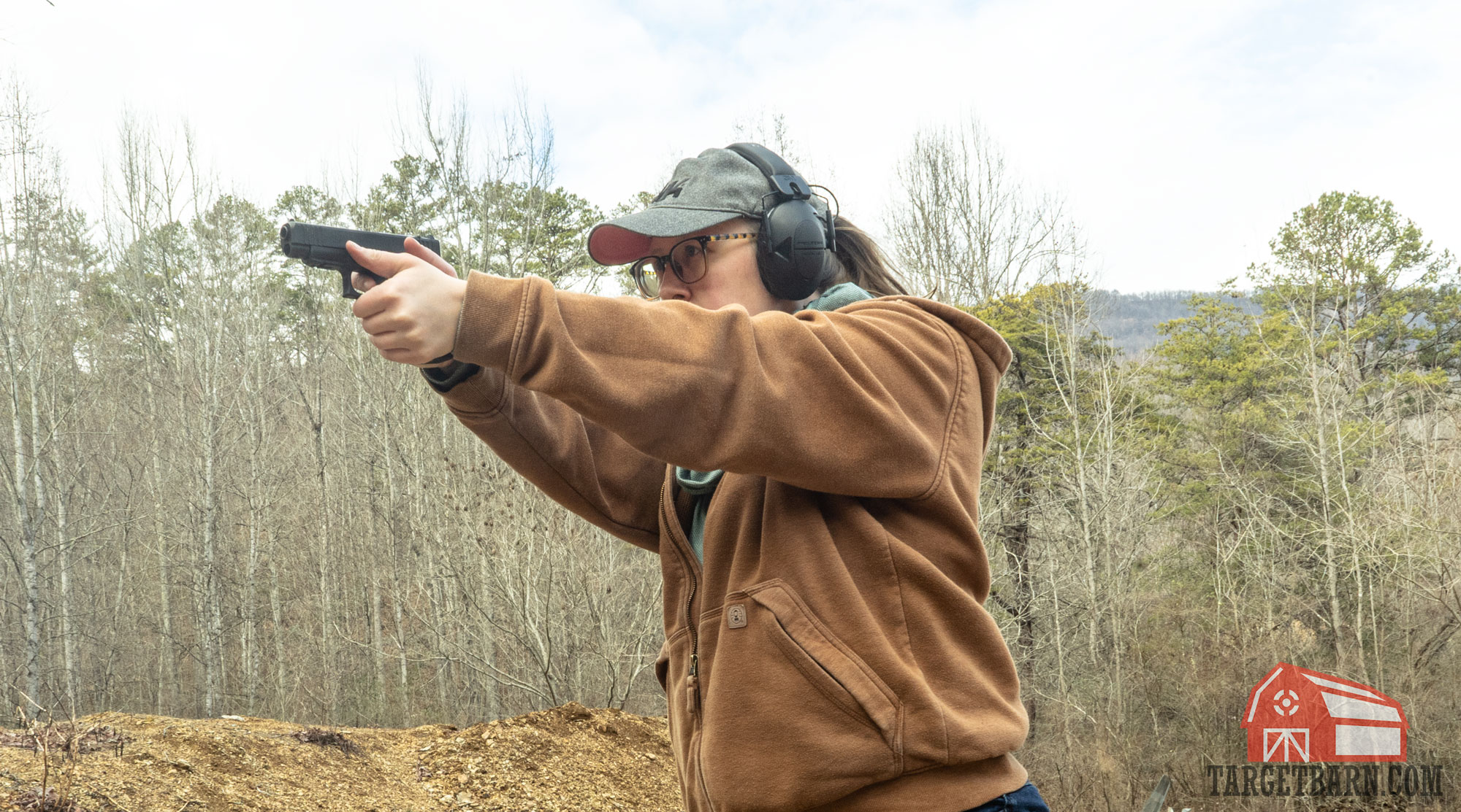 mckenzie shooting a 9mm glock pistol at the range