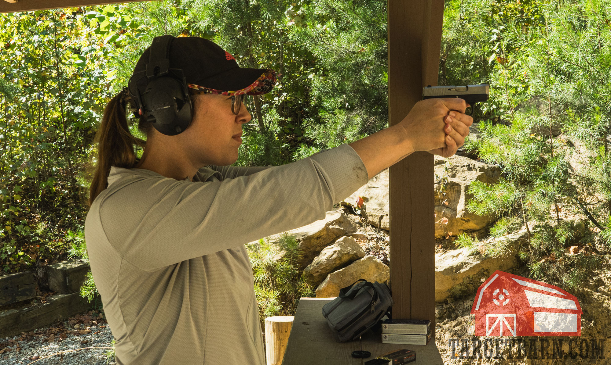 the author shooting the cw380 at the range