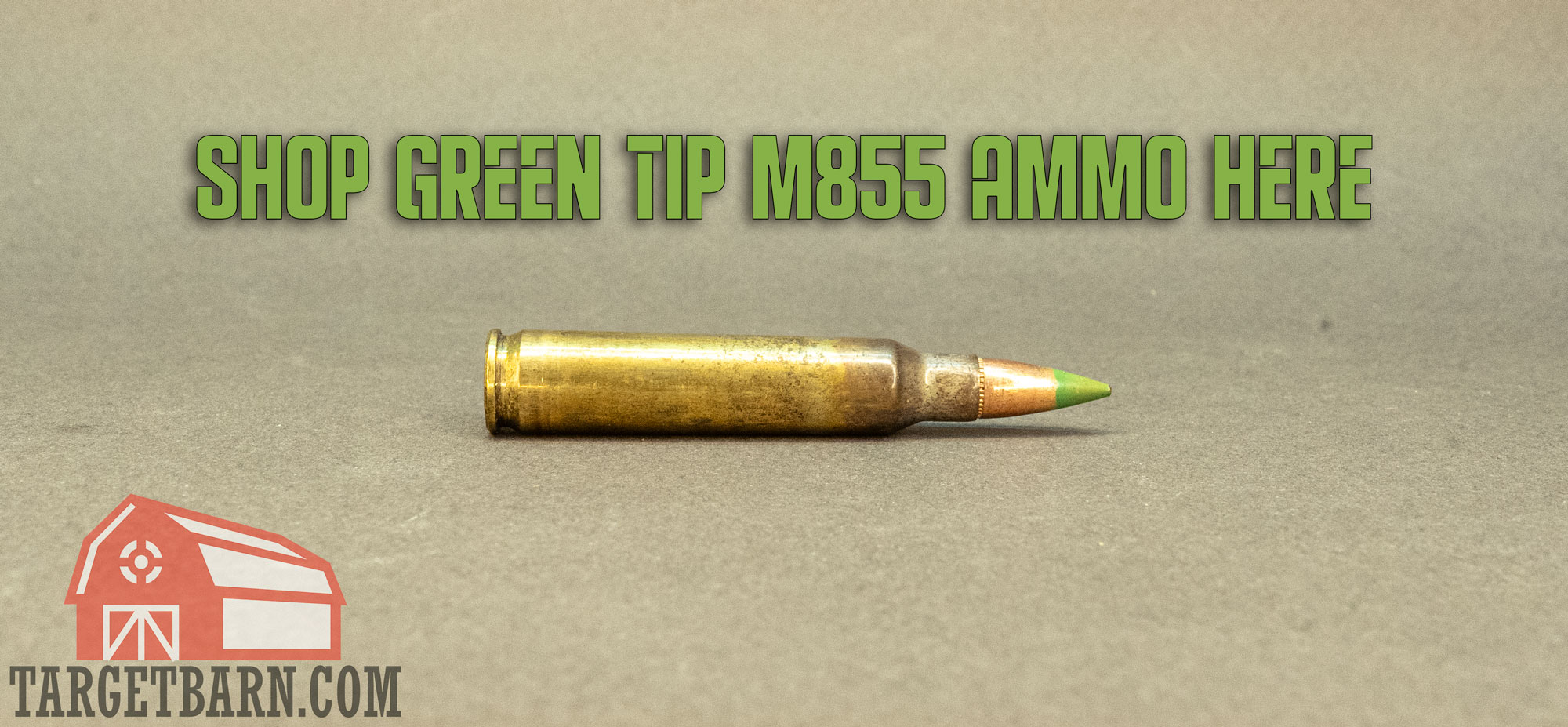 a round of m855 green tip ammo laying on its side