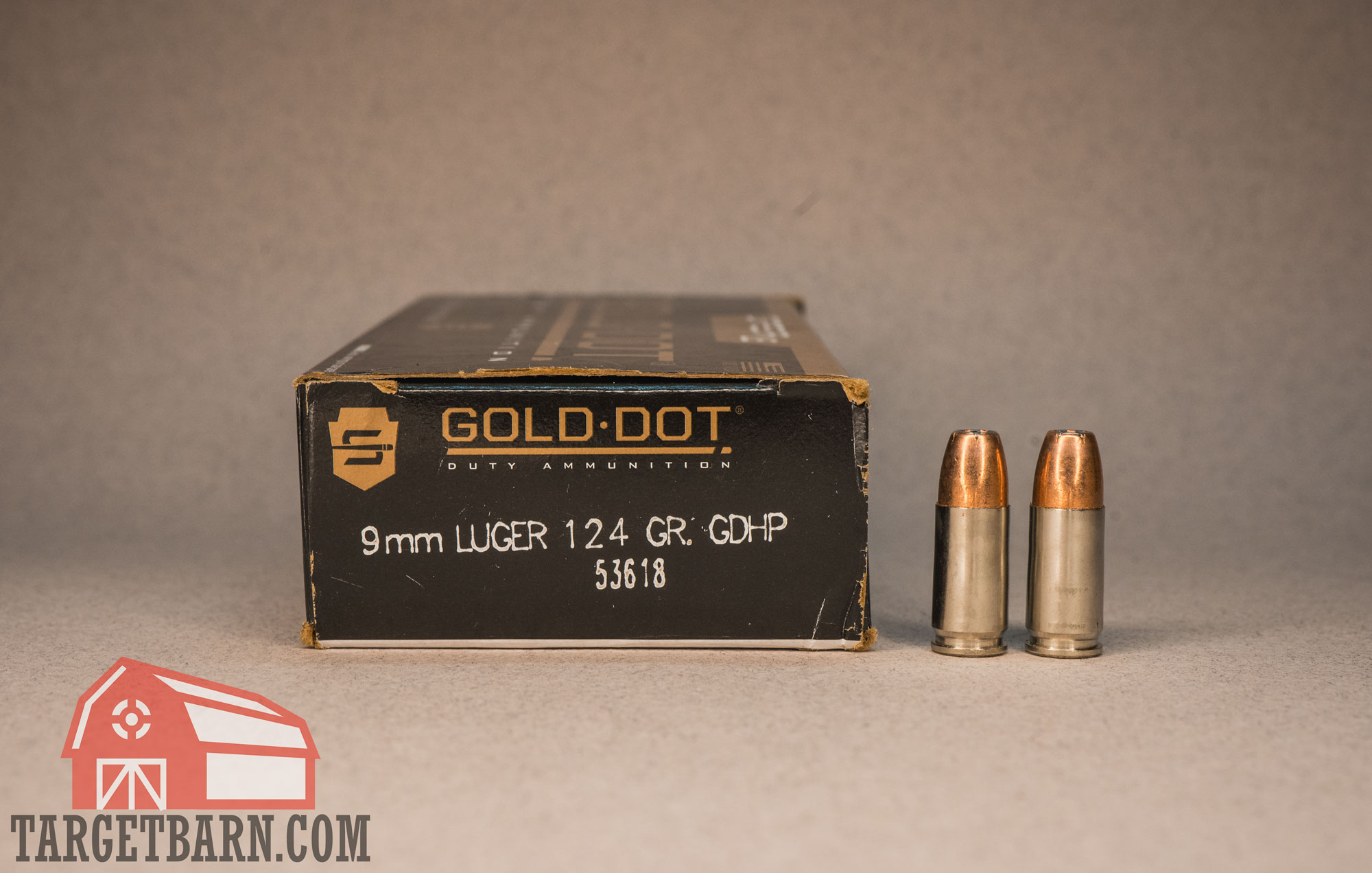 a box and two rounds of speer gold dot 9mm 124gr. gdhp