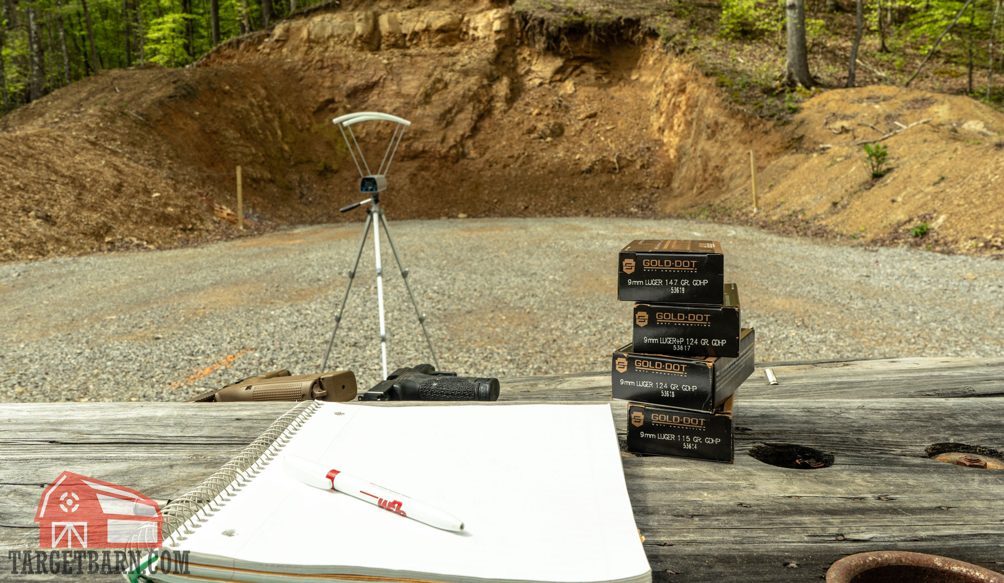 a chronograph, pen and paper, and four boxes of speer gold dot at the range