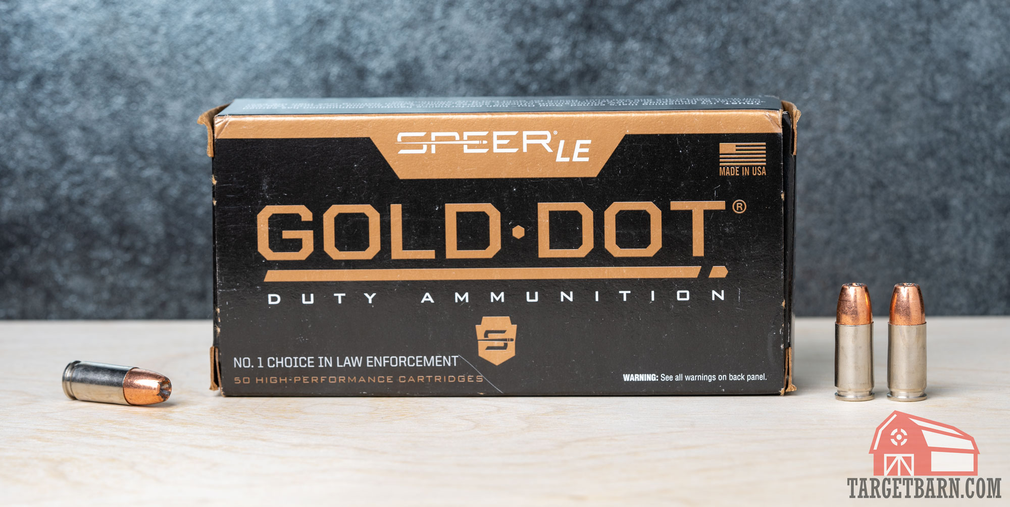 a box and three rounds of speer gold dot 124gr. le jhp 