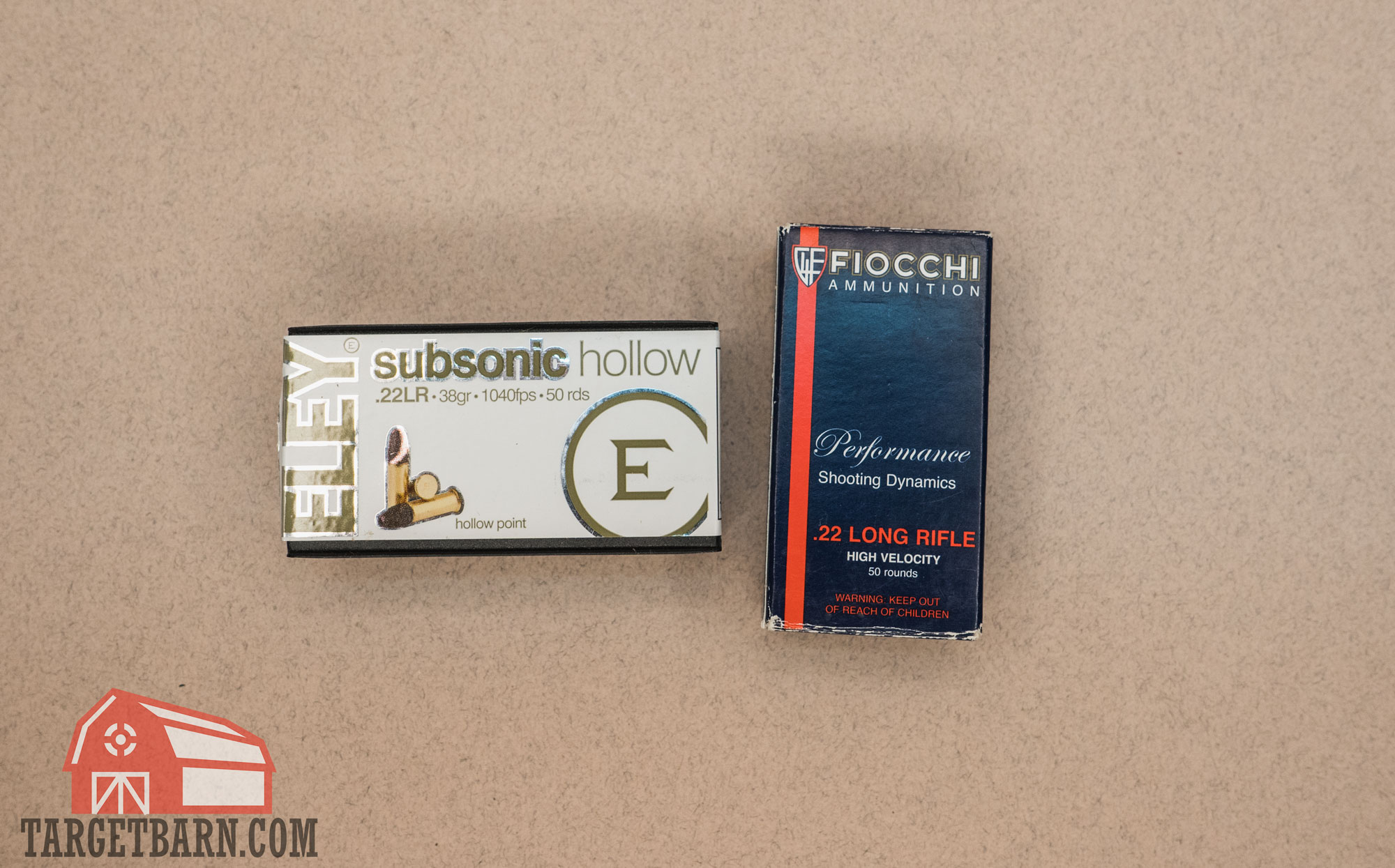 a box of subsonic eley ammo next to high velocity fiocchi