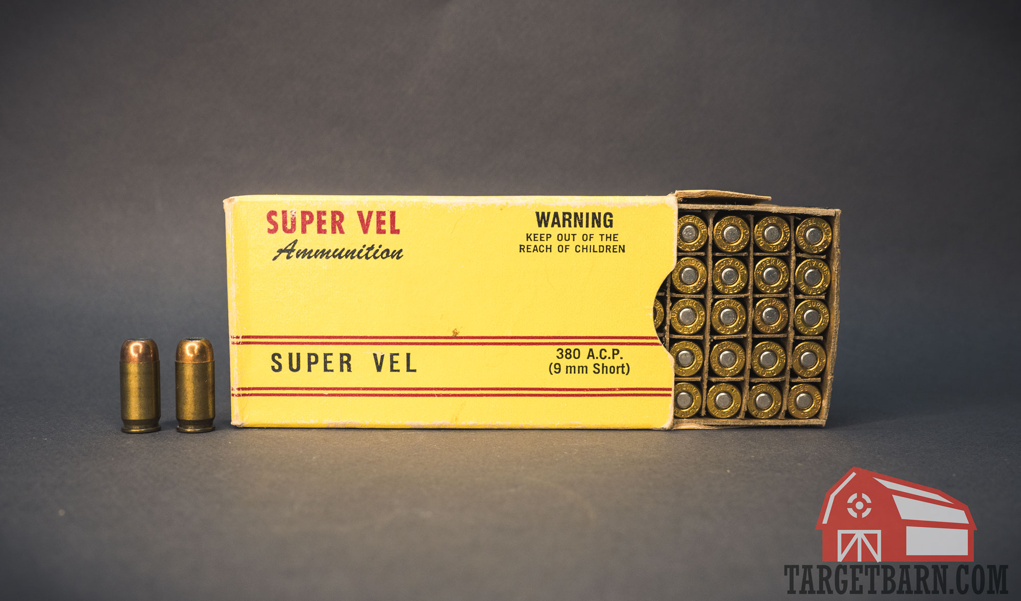 a box and two rounds of 50 year old super vel ammo