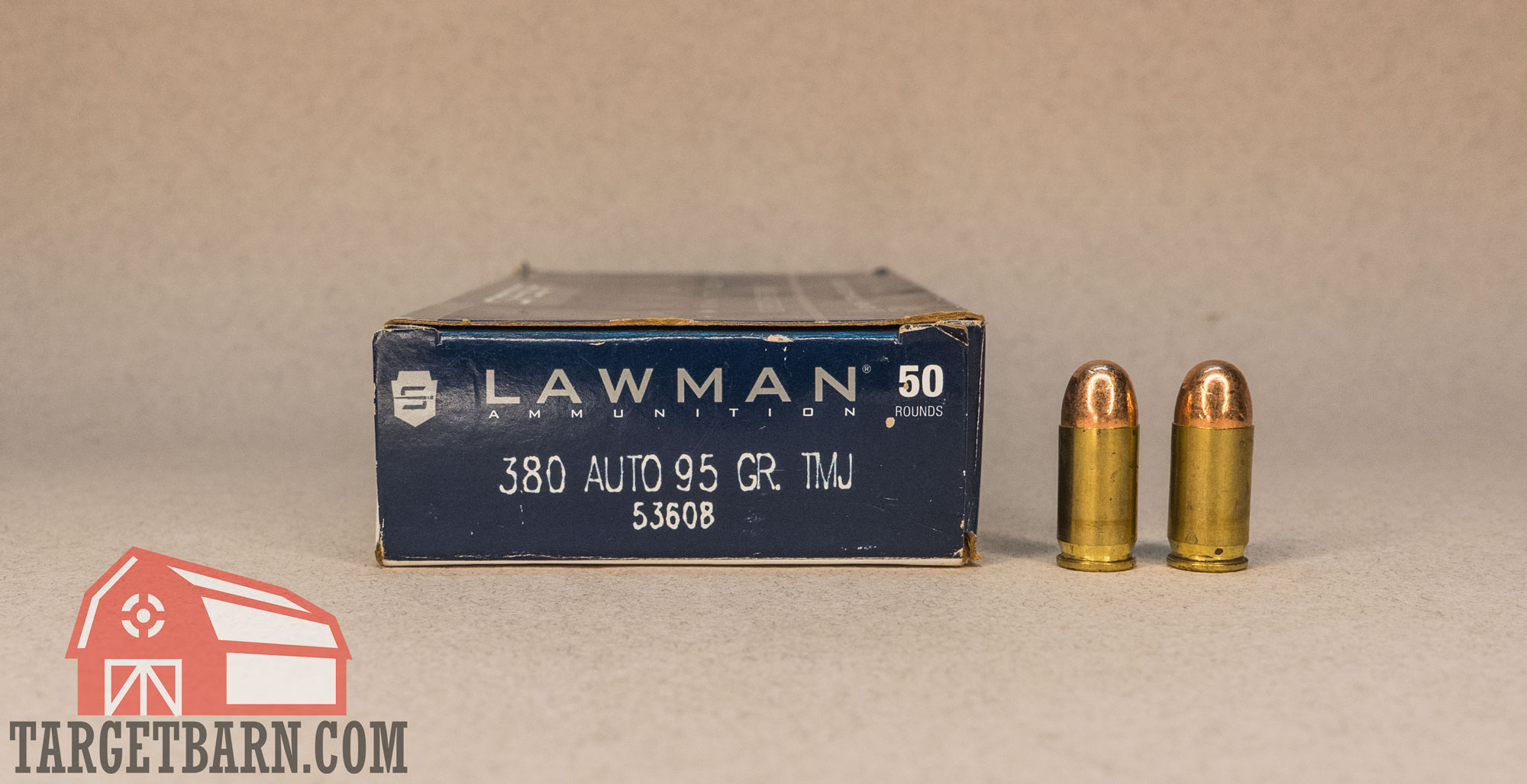 a box and two rounds of speer lawman 380 tmj ammo